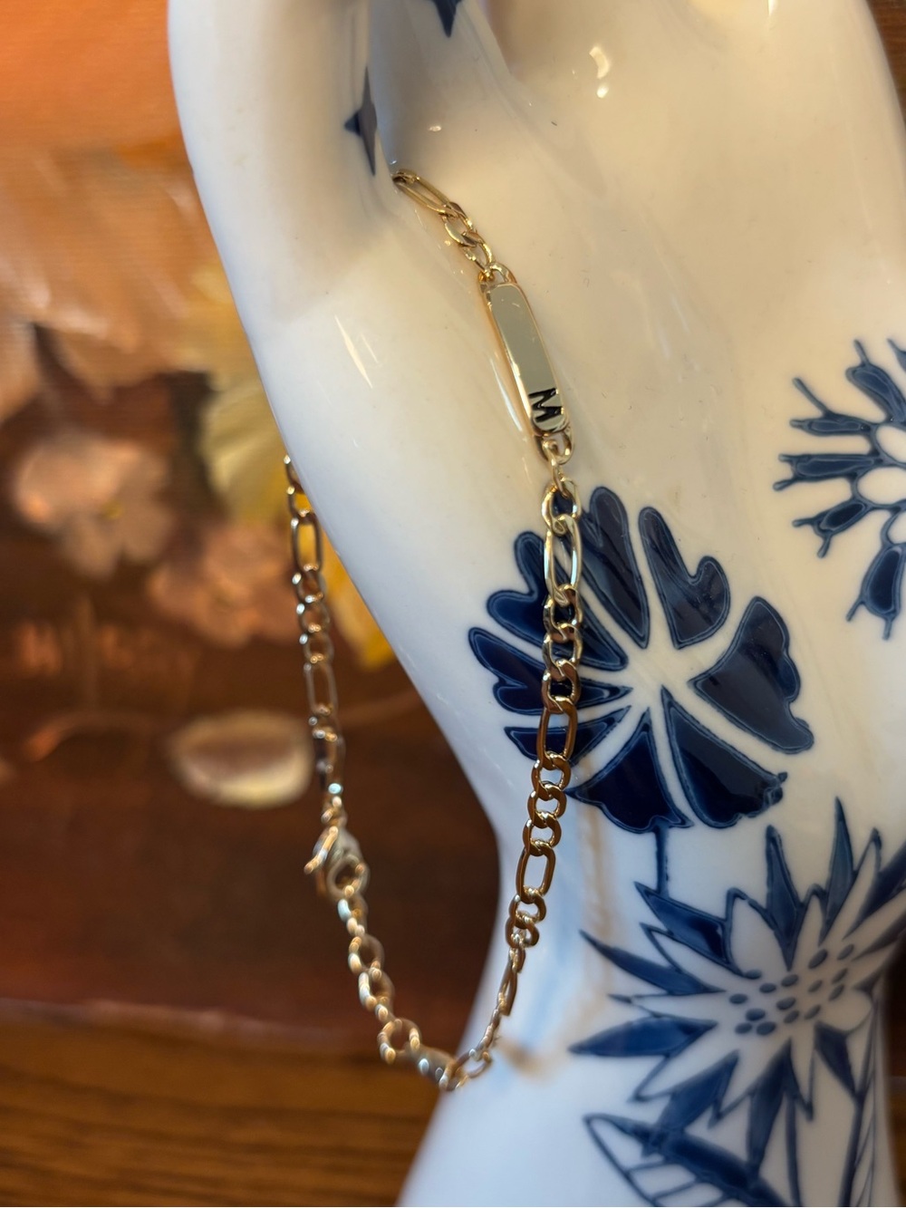 Gold-Tone Figaro Chain M Initial Clasp Bracelet with Crystal Accent